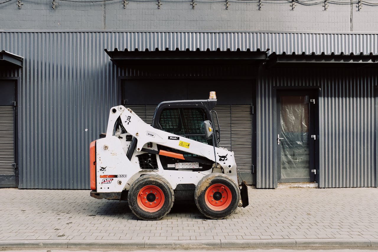 A Guide to Various Types of Skid Steer Attachments DA Construction